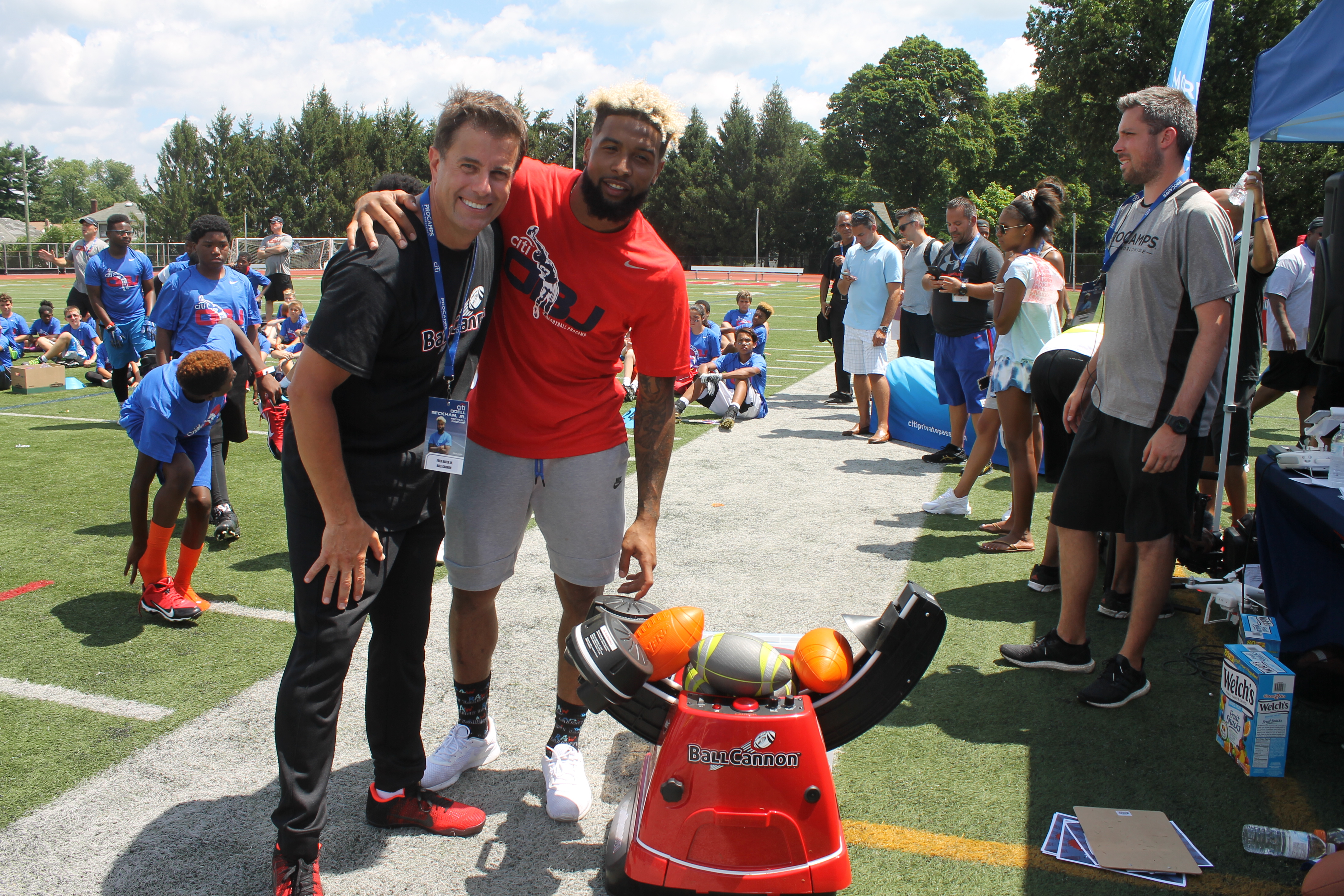 Fred Hafer, Jr. (President & CEO) and Odell Beckham, Jr. (NY Giants Wide Receiver) pose with the Ball Cannon at Boonton Highschool on July 26th, 2016.
